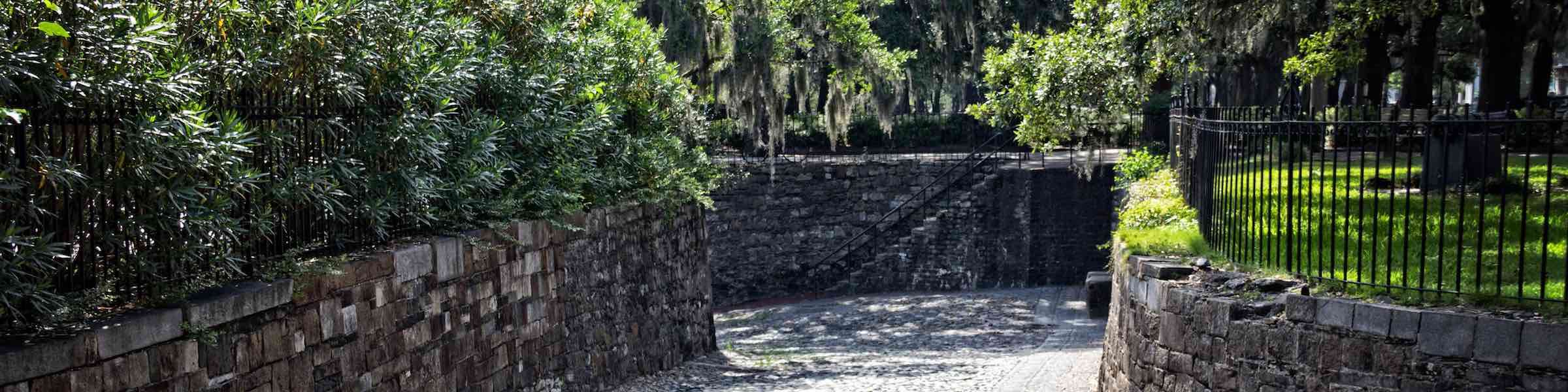 Cobblestone ramp and walls around the perimeter of Emmet Park, Savannah, GA.