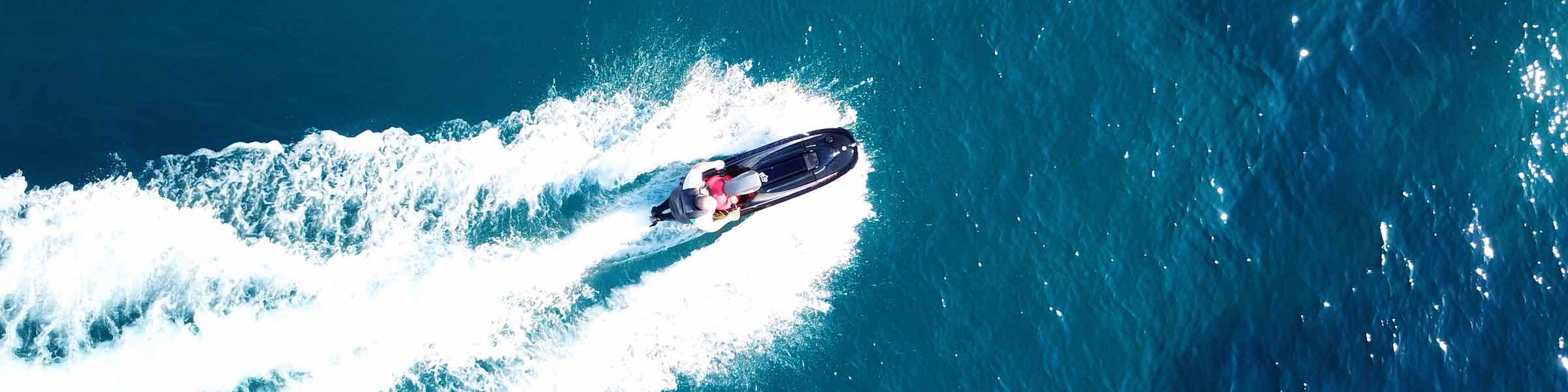 Aerial view of a man on a personal water craft.
