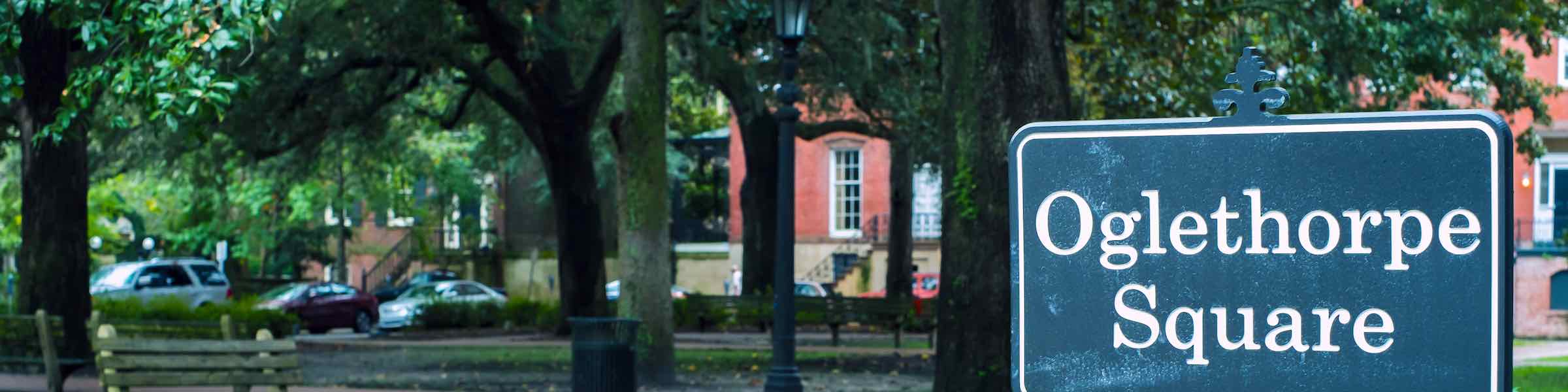 A sign marking Oglethorpe Square, in Savannah, GA.