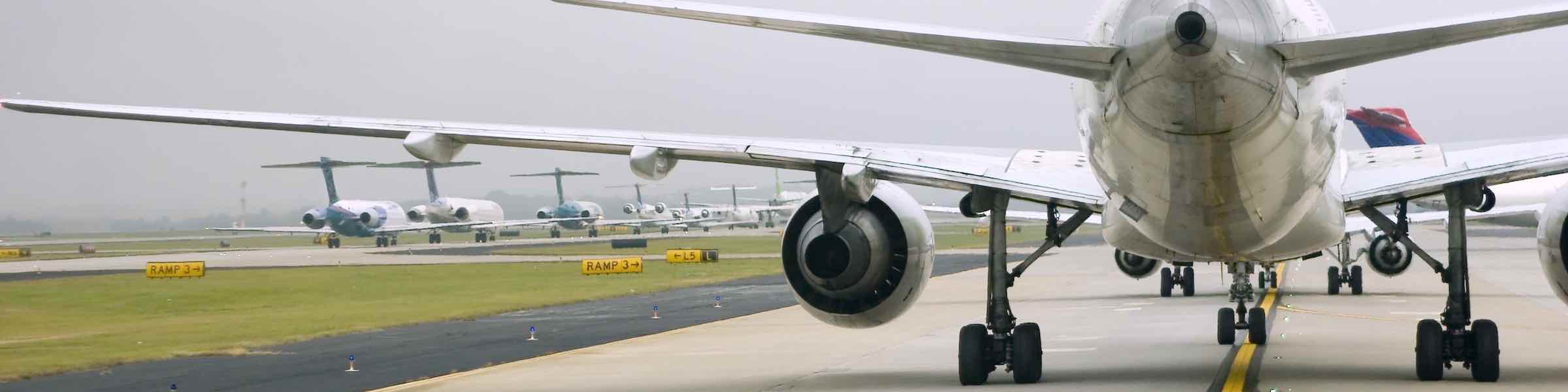 Plane on an airport runway.