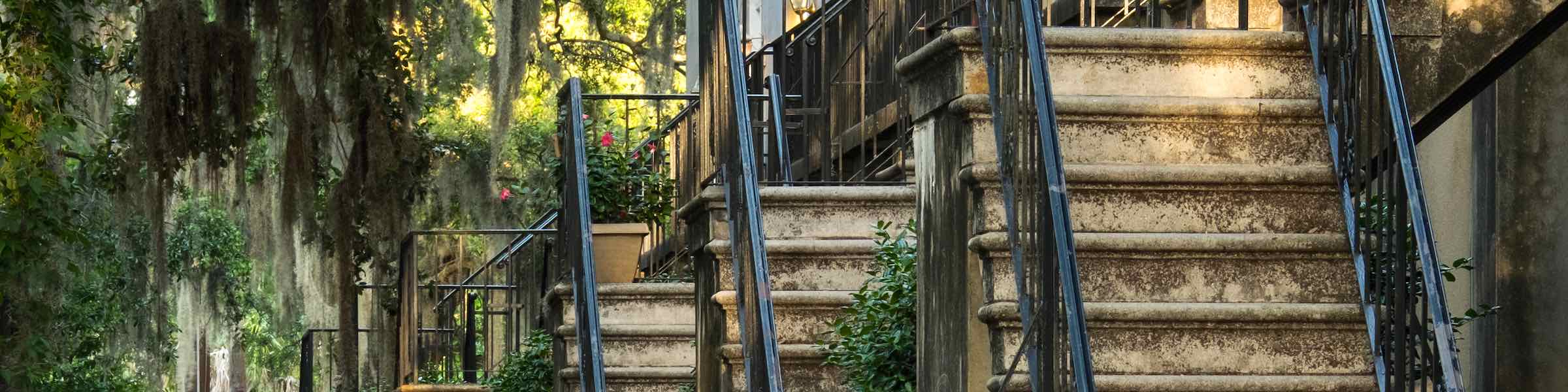 Steep stairs enter historic row houses in Savannah, GA.